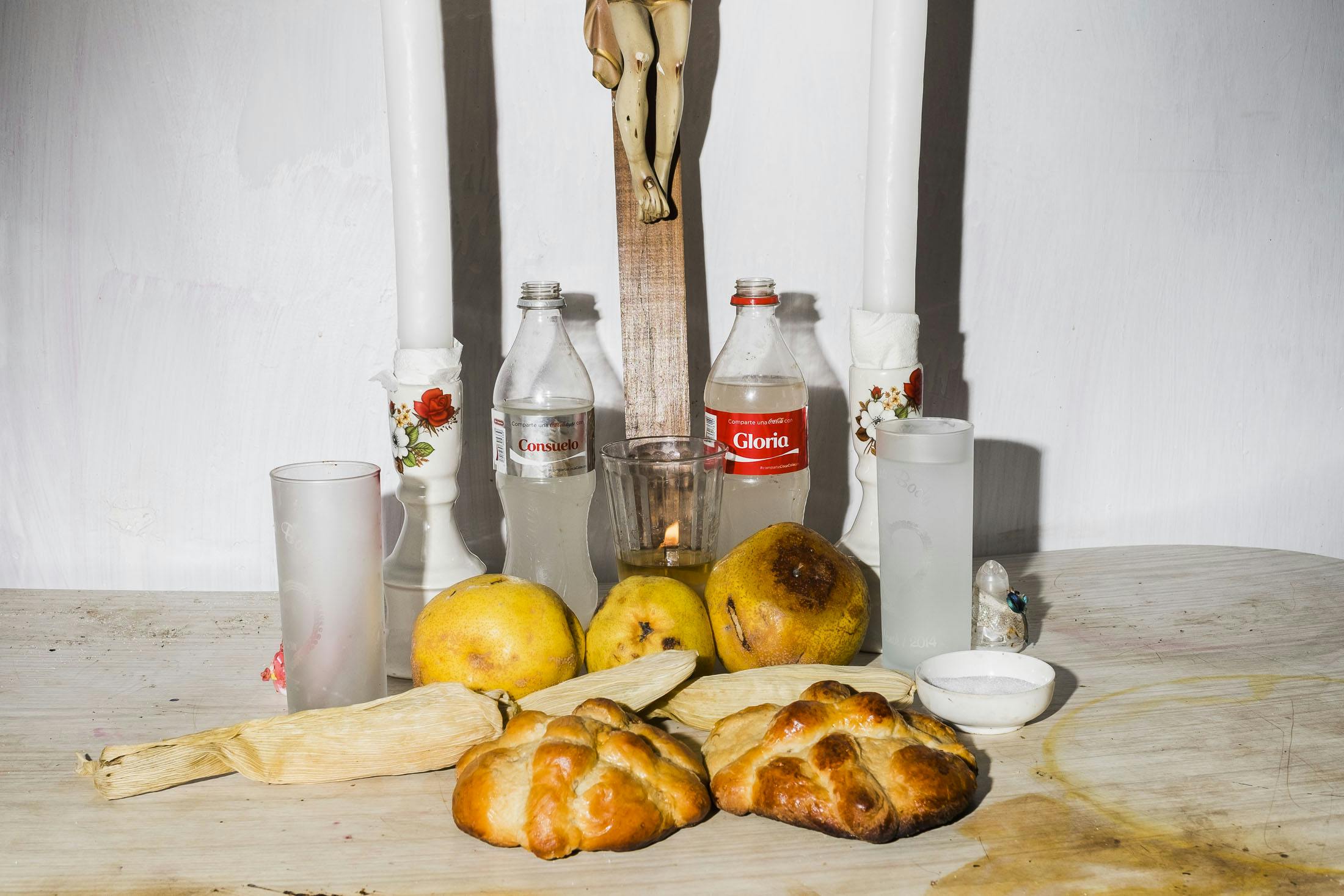 Day of the dead offerings with coke bottles and bread