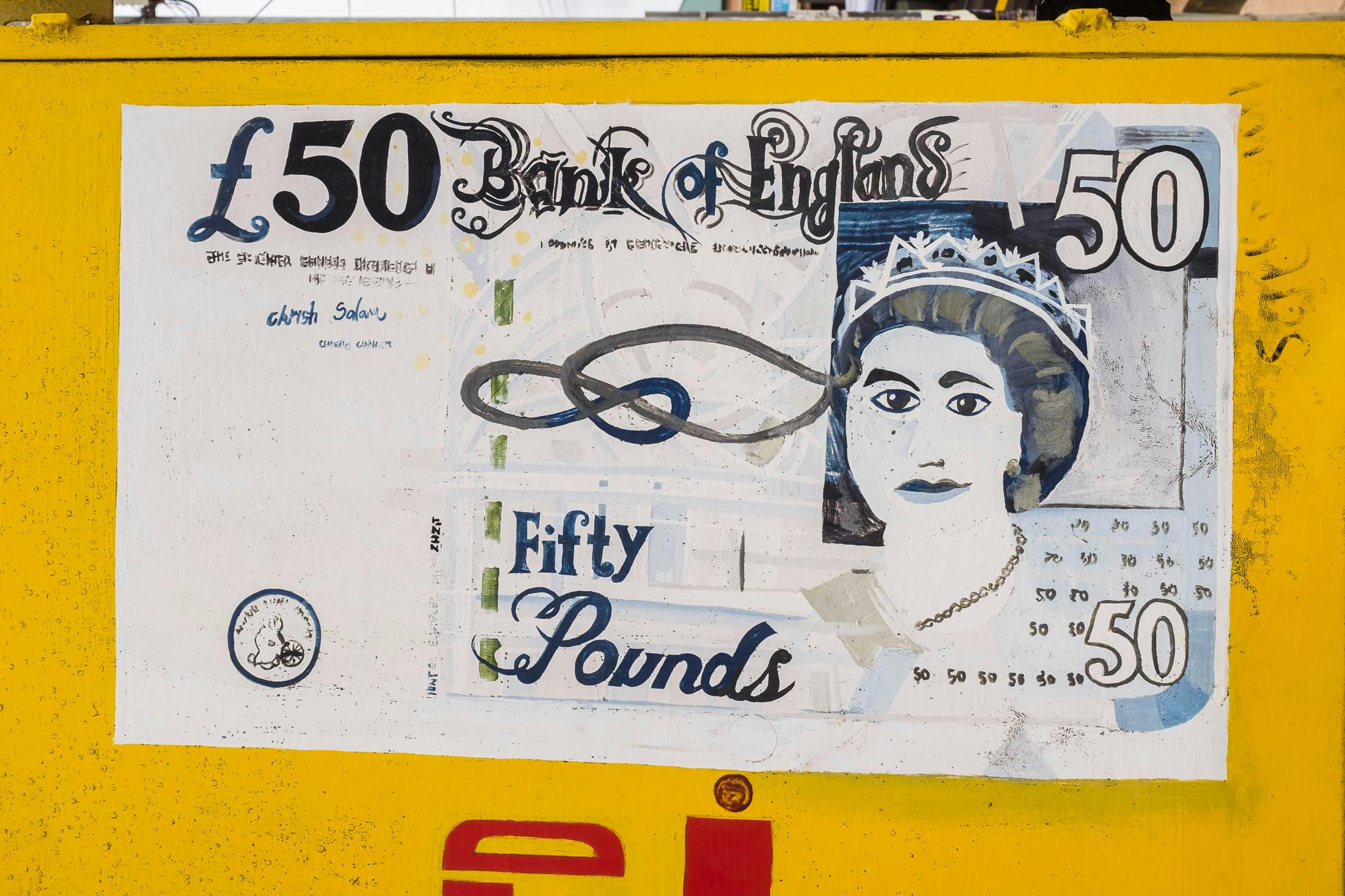 Fifty pound note painted sign in Ghana
